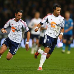 Tyrone Mears and Chris Eagles push forward late on in hopes of getting another goal for Bolton