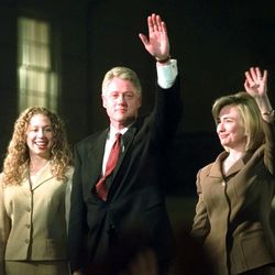 President Bill Clinton, wife Hillary and daughter Chelsea wave to supporters in front of the Old State House during an election night celebration in Little Rock, Ark., Tuesday, Nov. 5, 1996.
