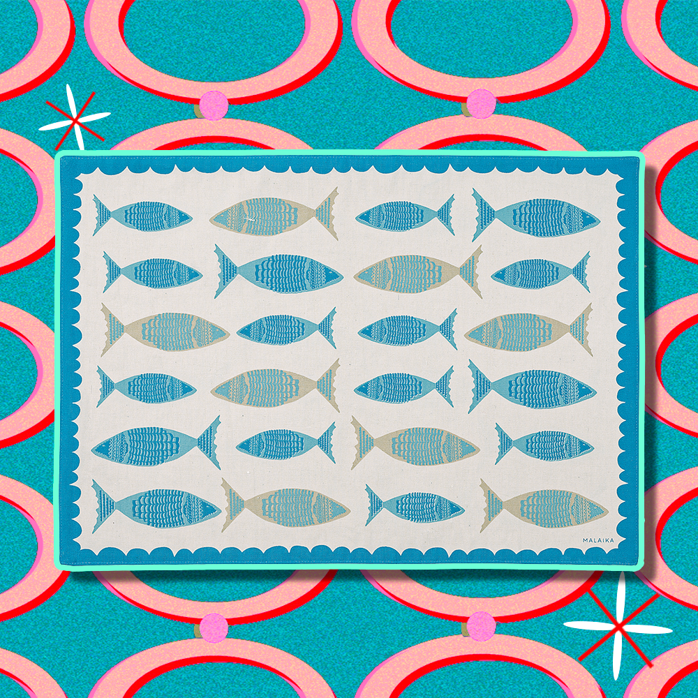 A place mat with a fish motif 