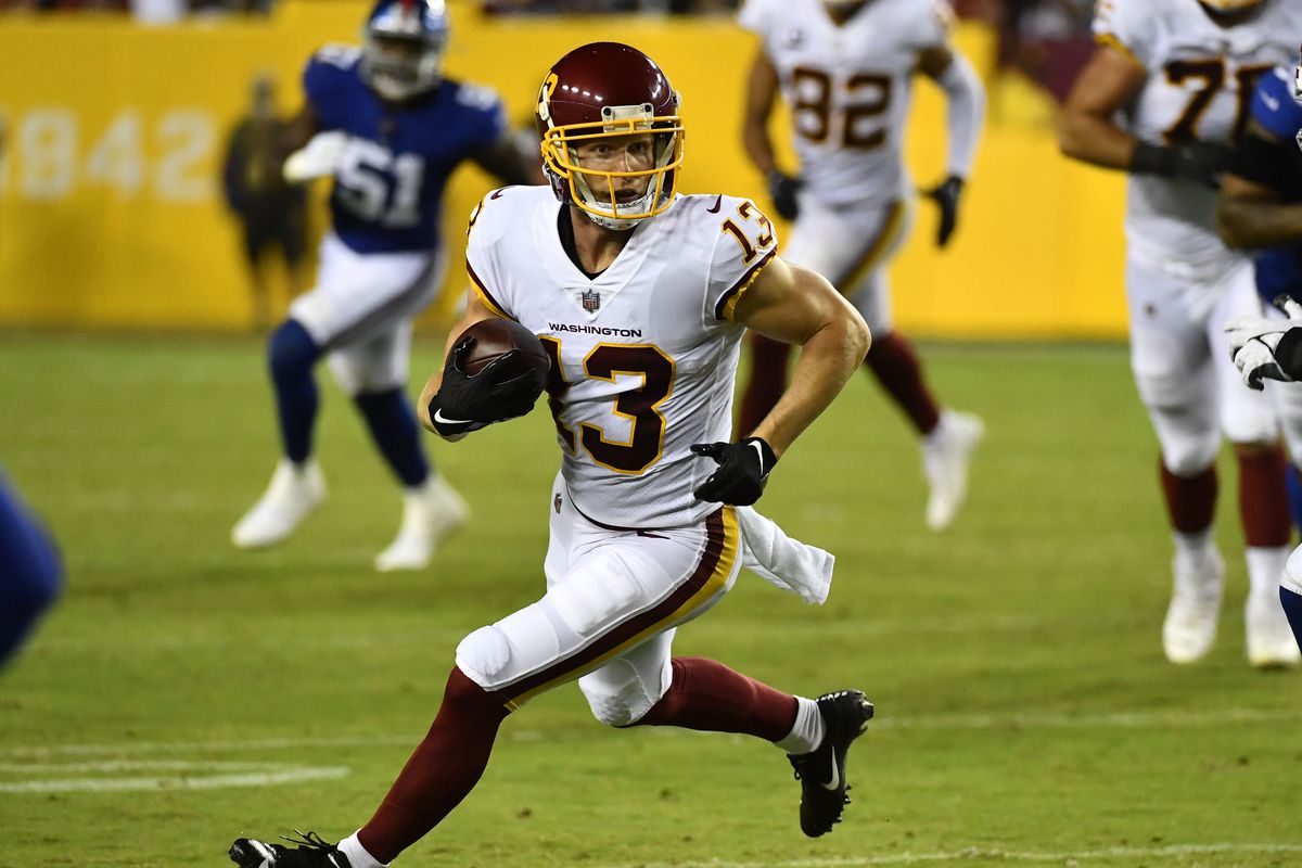Washington Football Team wide receiver Adam Humphries (13) carries the ball against the New York Giants during the second half at FedExField.