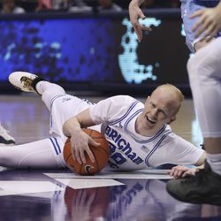 Brigham Young Cougars guard TJ Haws (30) hits the floor after being fouled by the San Diego Toreros in Provo on Thursday, Jan. 16, 2020. BYU won 93-70.