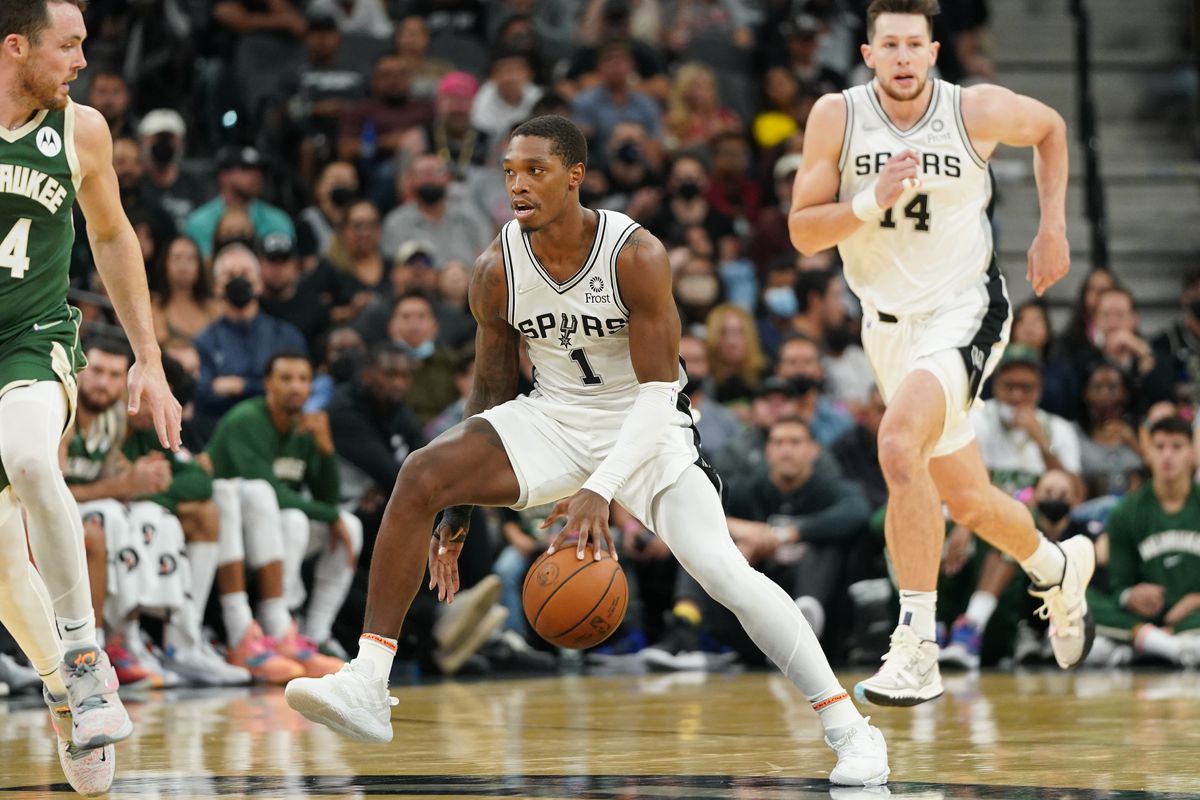 San Antonio Spurs guard Lonnie Walker IV (1) dribbles in the second half against the Milwaukee Bucks at the AT&amp;amp;T Center.