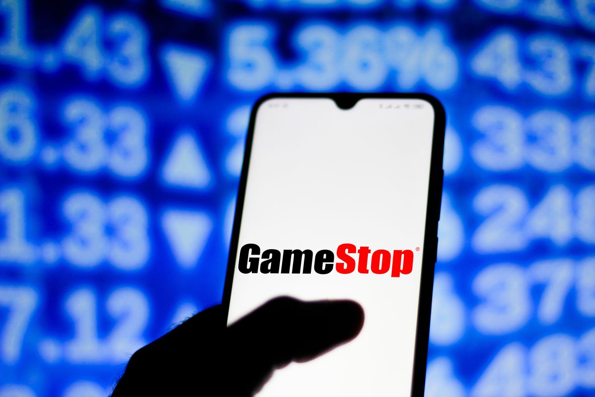 In this photo illustration the GameStop logo seen displayed...