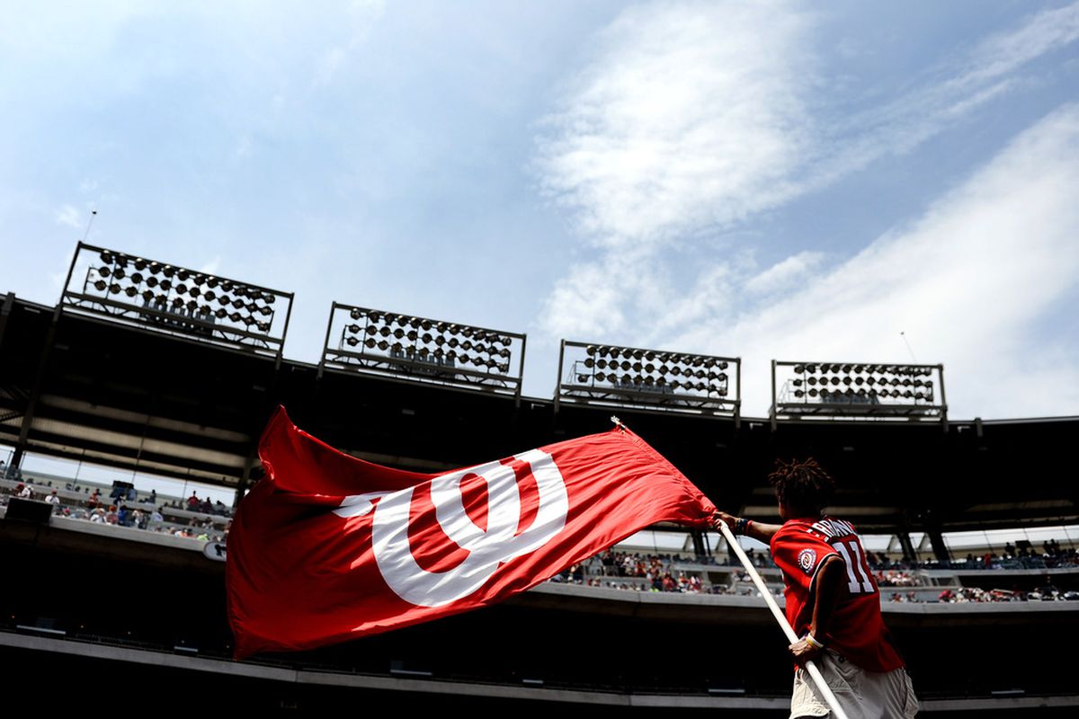 WASHINGTON, DC - JUNE 18: A Washington National fan pumps up the crowd before taking on the Baltimore Orioles at Nationals Park on June 18, 2011 in Washington, DC. The Washington Nationals won, 4-2. (Photo by Patrick Smith/Getty Images)