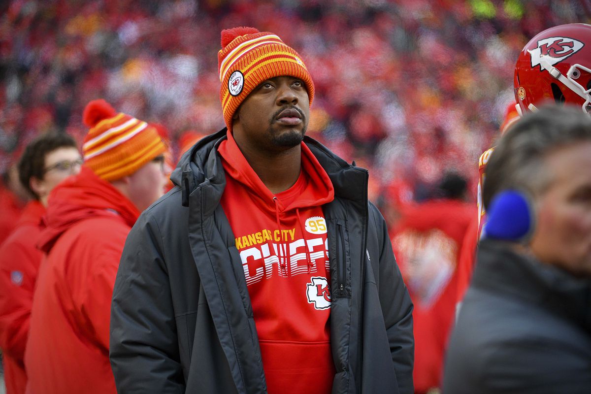 Kansas City Chiefs defensive tackle Chris Jones walks the sidelines during the second quarter against the Houston Texans in a AFC Divisional Round playoff football game at Arrowhead Stadium.