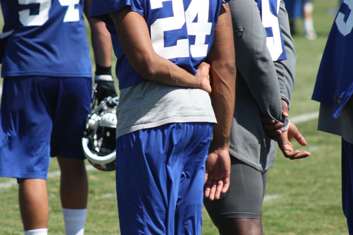 Terrell Thomas watches Giants practice on Wednesday, the first practice he has attended since injuring his knee early in training camp. (Photo by Ryan Valentine/Big Blue View)