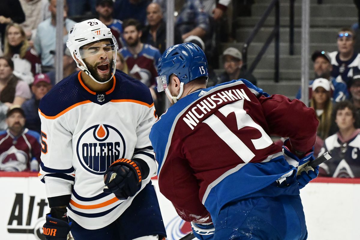 Edmonton Oilers defenseman Darnell Nurse (25) has a few words for Colorado Avalanche right wing Valeri Nichushkin (13) during game two of the NHL Stanley Cup Western Conference Finals at Ball Arena June 02, 2022.