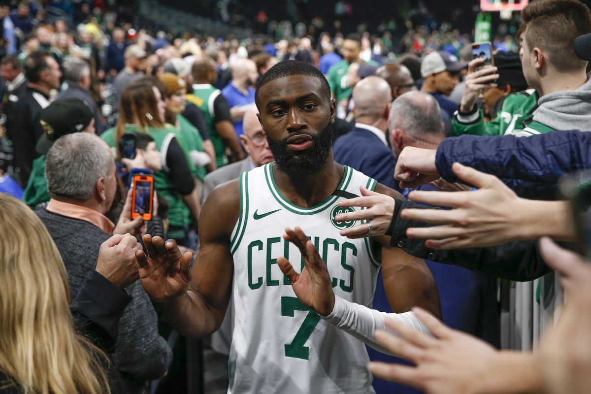 Boston Celtics guard Jaylen Brown greets fans after defeating the Chicago Bulls at TD Garden.