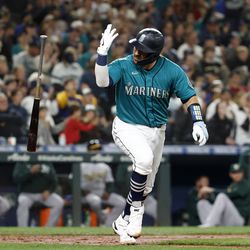 Luis Torrens #22 of the Seattle Mariners celebrates his single during the seventh inning
