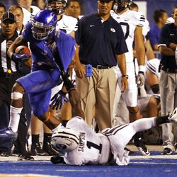 Joe Sampson of the Brigham Young Cougars pulls down D.J. Harper of the Boise State Broncos during NCAA football in Boise, Thursday, Sept. 20, 2012. 