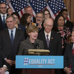 Sen. Tammy Baldwin, D-Wis., flanked by House Judiciary Committee Chairman Jerrold Nadler, D-N.Y., left, and Rep. David Cicilline, D-R.I., right, joins fellow Democrats as they announce the introduction of The Equality Act, a comprehensive nondiscrimination bill for LGBT rights, at the Capitol in Washington, Wednesday, March 13, 2019. Baldwin, an LGBT rights activist, was the first openly gay woman elected to the Senate.