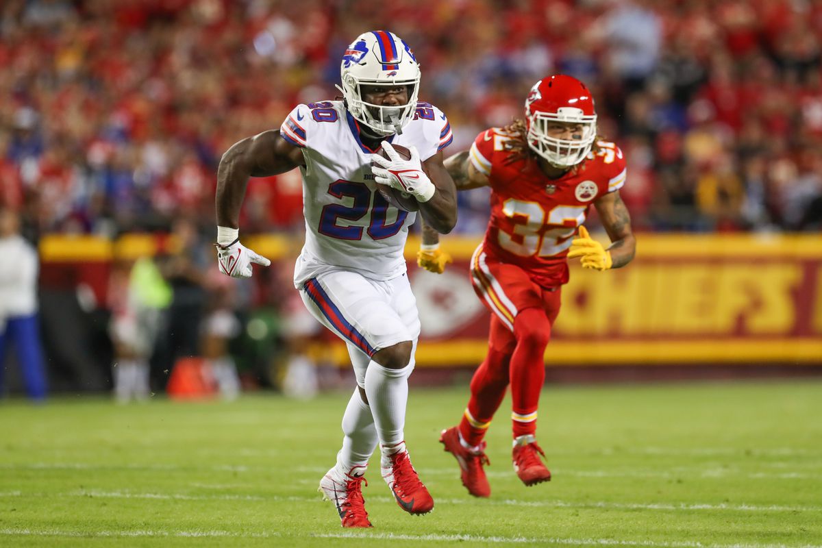 Buffalo Bills running back Zack Moss (20) is chased by Kansas City Chiefs free safety Tyrann Mathieu (32) during a run in the first quarter of an NFL football game between the Buffalo Bills and Kansas City Chiefs on Oct 10, 2021 at GEHA Filed at Arrowhead Stadium in Kansas City, MO.