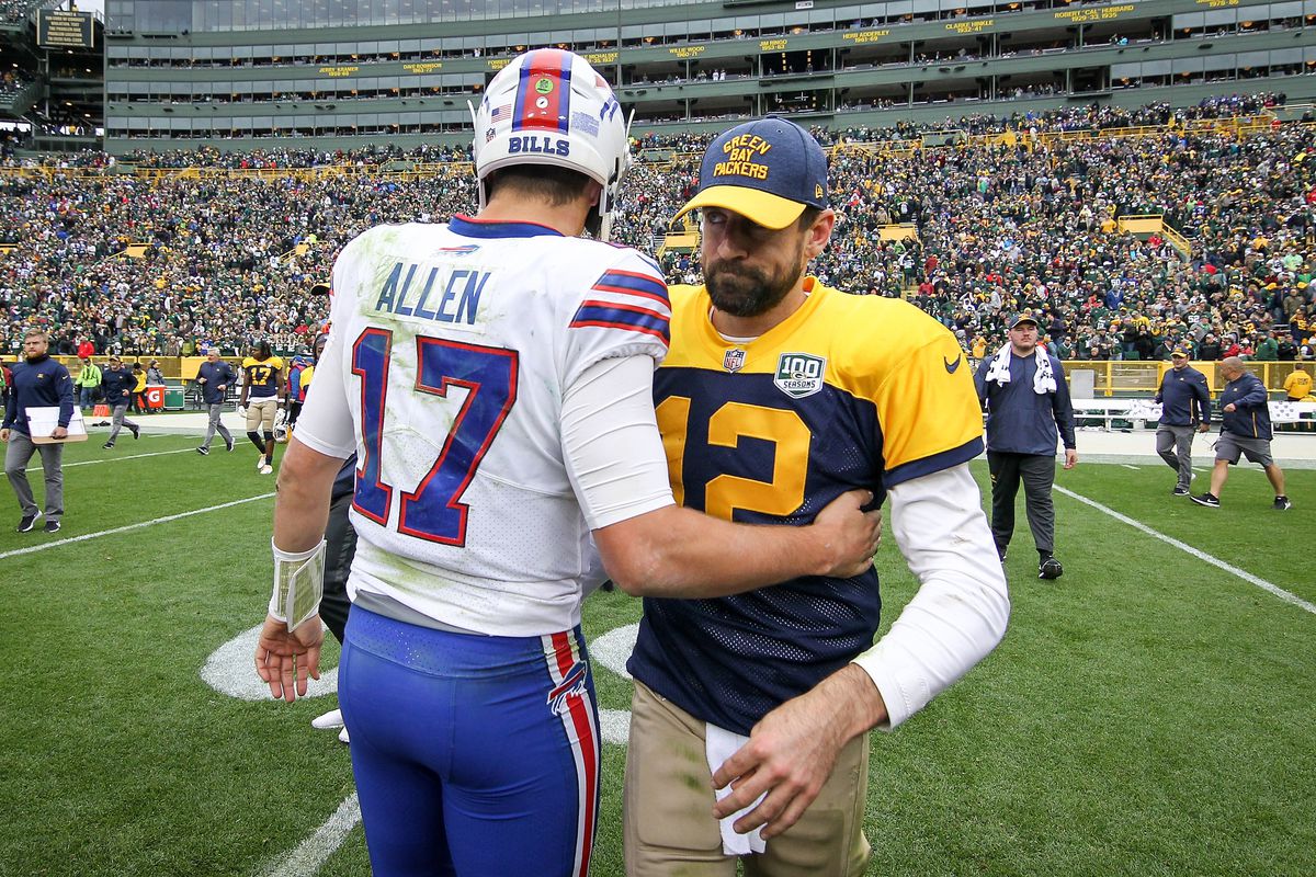 GREEN BAY, WI - SEPTEMBER 30: Josh Allen #17 of the Buffalo Bills and Aaron Rodgers #12 of the Green Bay Packers meet after the Green Bay Packers beat the Buffalo Bills 22-0 at Lambeau Field on September 30, 2018 in Green Bay, Wisconsin.