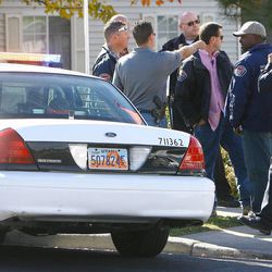 West Valley police officers investigate the shooting death of Danielle Willard near 3715 South and 2200 West on Nov. 2, 2012, in West Valley City. Ninety-six criminal cases investigated by the department have now been dismissed because of credibility issues connected to allegations of corruption.