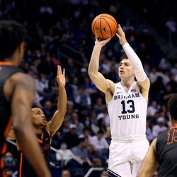 Brigham Young Cougars guard Alex Barcello (13) puts up a shot as BYU and Pacific play in an NCAA basketball game in Provo at the Marriott Center on Thursday, Jan. 6, 2022. BYU won 73-51.