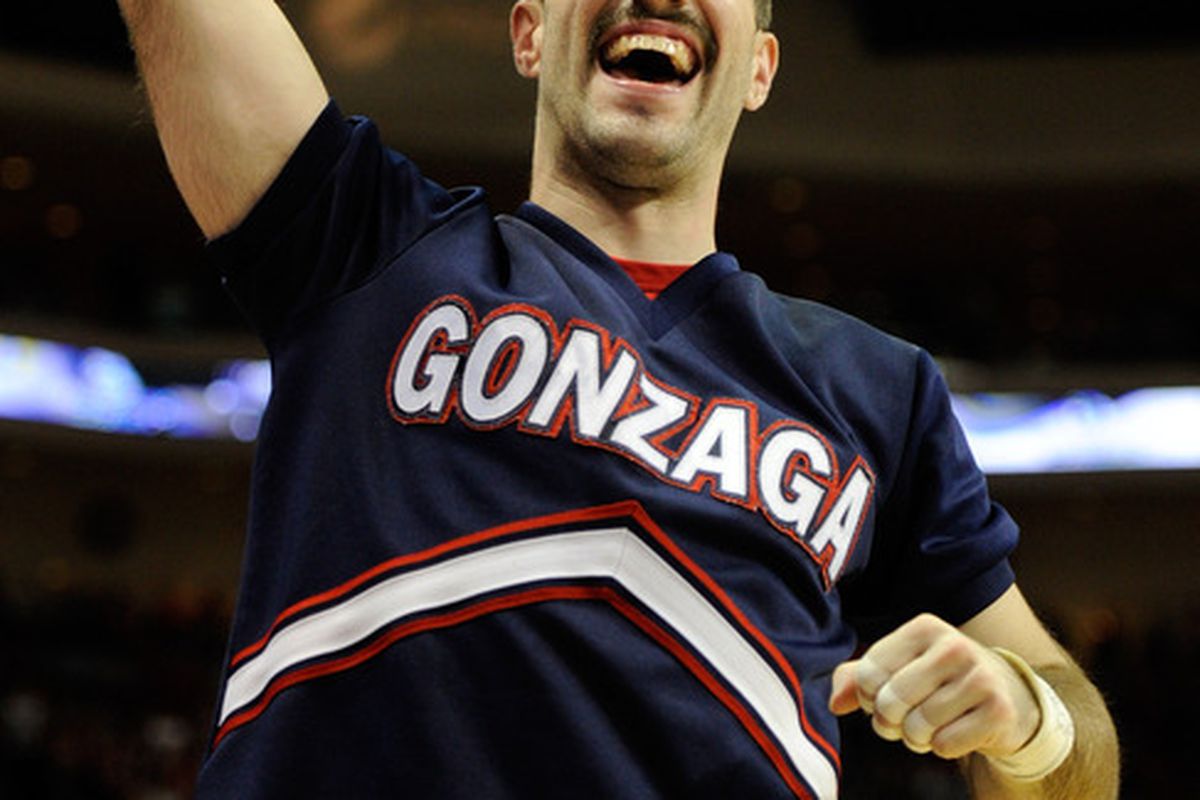 Follow the lead from this mustachioed Gonzaga cheerleader and get your root on during conference tournaments across the country.