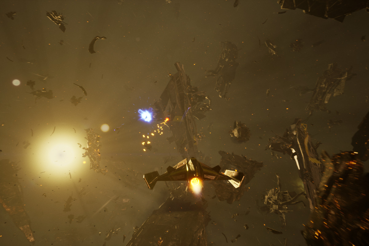A space ship flies through an eerie-looking area filled with wreckage of other ships