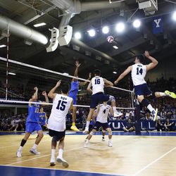 BYU outside hitter Storm Fa'agata-Tufuga (14) rises up for a spike attempt during the Cougars' 3-1 win over UCLA in the Mountain Pacific Sports Federation championship at Smith Fieldhouse in Provo on Saturday, April 21, 2018.