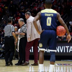 Utah Utes head coach Larry Krystkowiak gets ejected from the game as Utah and UC Davis play in an NIT basketball game at the Huntsman Center in Salt Lake City on Wednesday, March 14, 2018. Utah won 69-59.