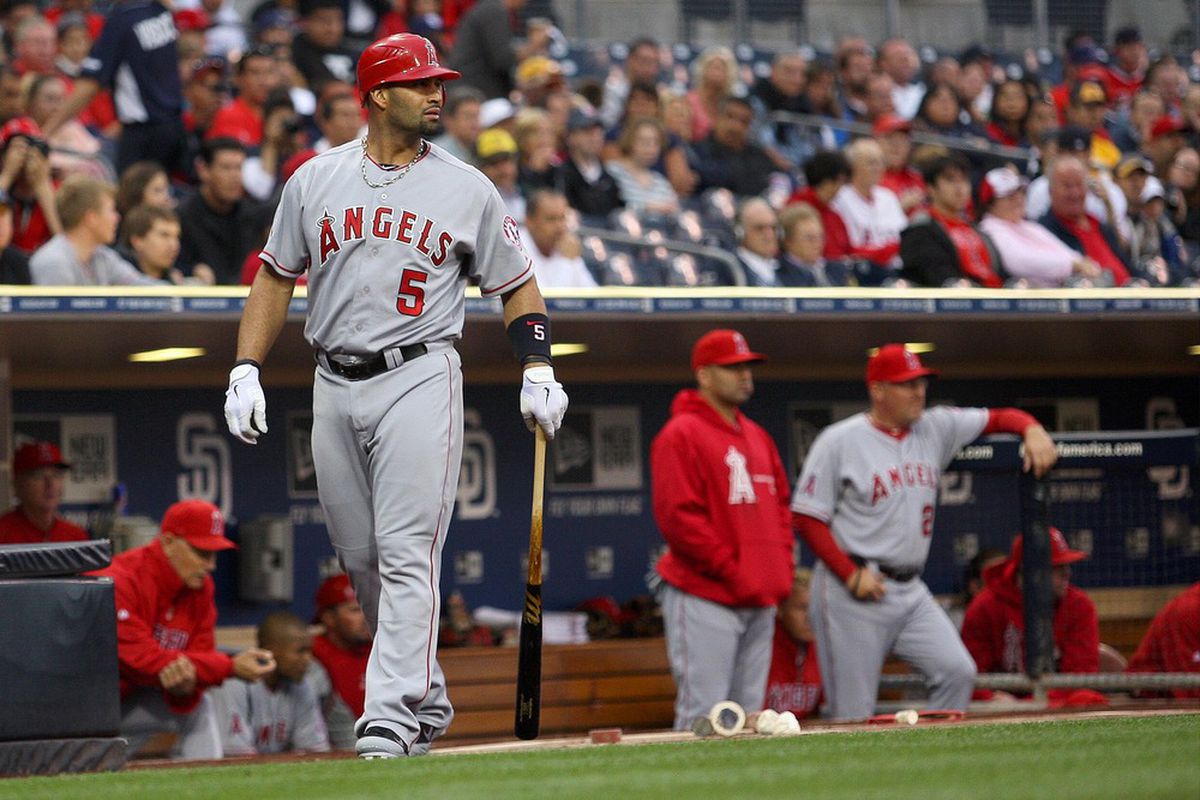 May 18, 2012; San Diego, CA, USA; Los Angeles Angels first baseman Albert Pujols (5) walks out to the on-deck circle during the first inning against the San Diego Padres at PETCO Park. Mandatory Credit: Jake Roth-US PRESSWIRE