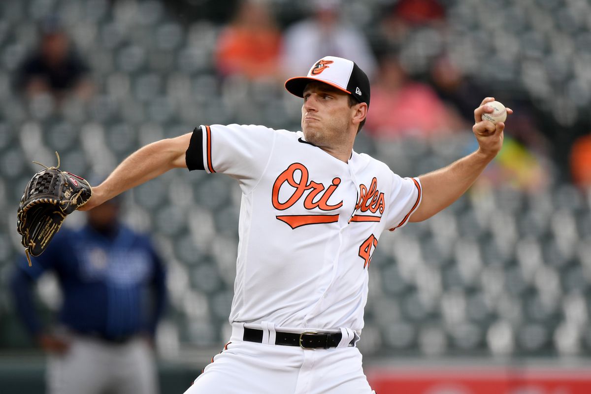 John Means #47 of the Baltimore Orioles pitches against the Tampa Bay Rays at Oriole Park at Camden Yards on May 19, 2021 in Baltimore, Maryland.