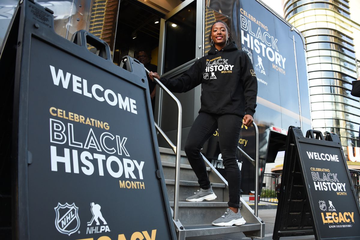 Blake Bolden, the first black NWHL player, poses in front of the Black Hockey History Museum before the game between the Pittsburgh Penguins and the Los Angeles Kings at STAPLES Center on February 26, 2020 in Los Angeles, California.