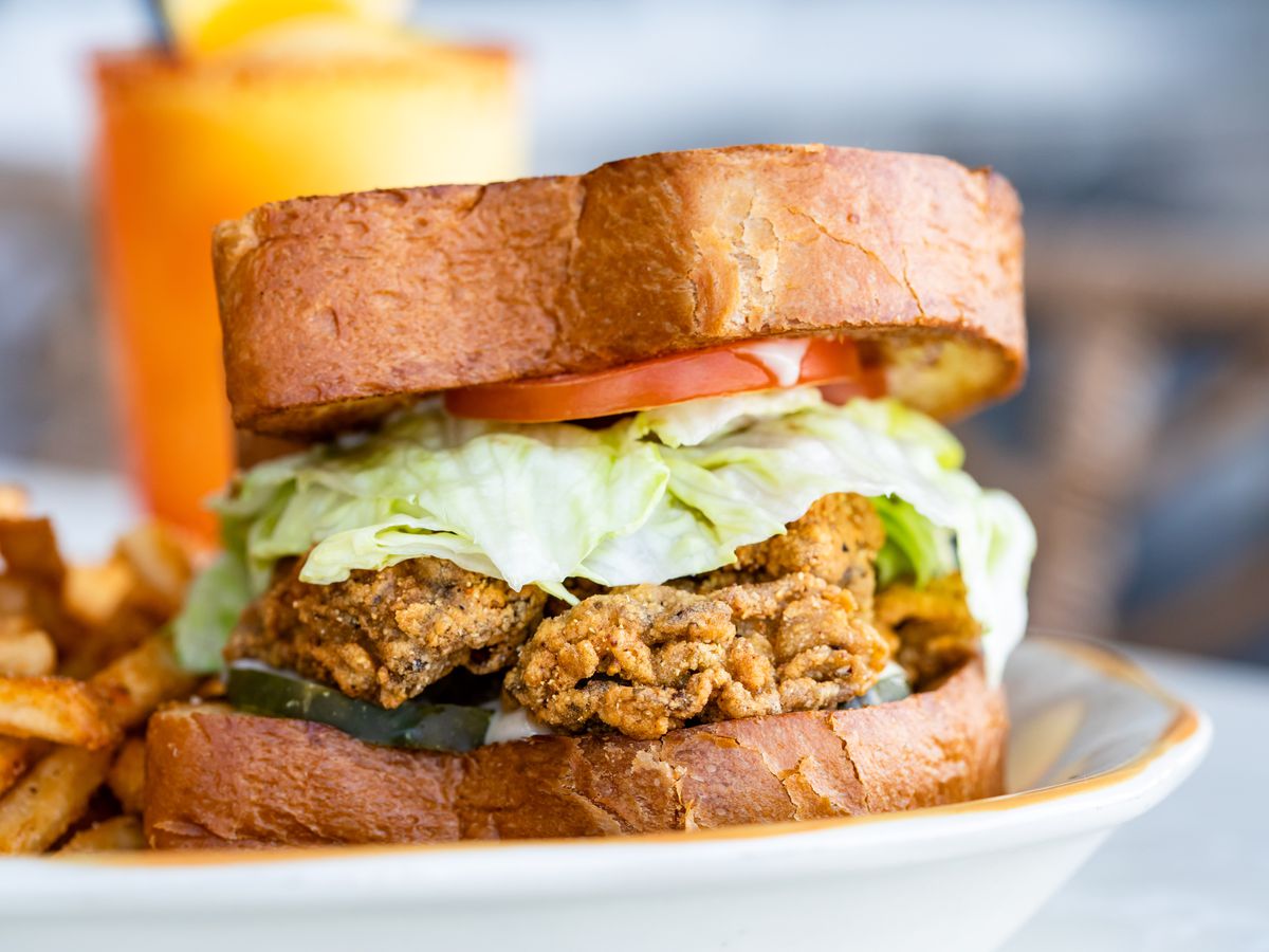 Pier 6’s Fried Oysterman sandwich, where fried cornmeal-crusted oysters are loaded on Texas toast with lettuce and tomato.