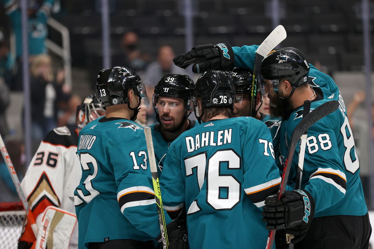 Logan Couture #39 of the San Jose Sharks is congratulated by teammates after he scored against the Anaheim Ducks in the second period is at SAP Center on October 04, 2021 in San Jose, California.