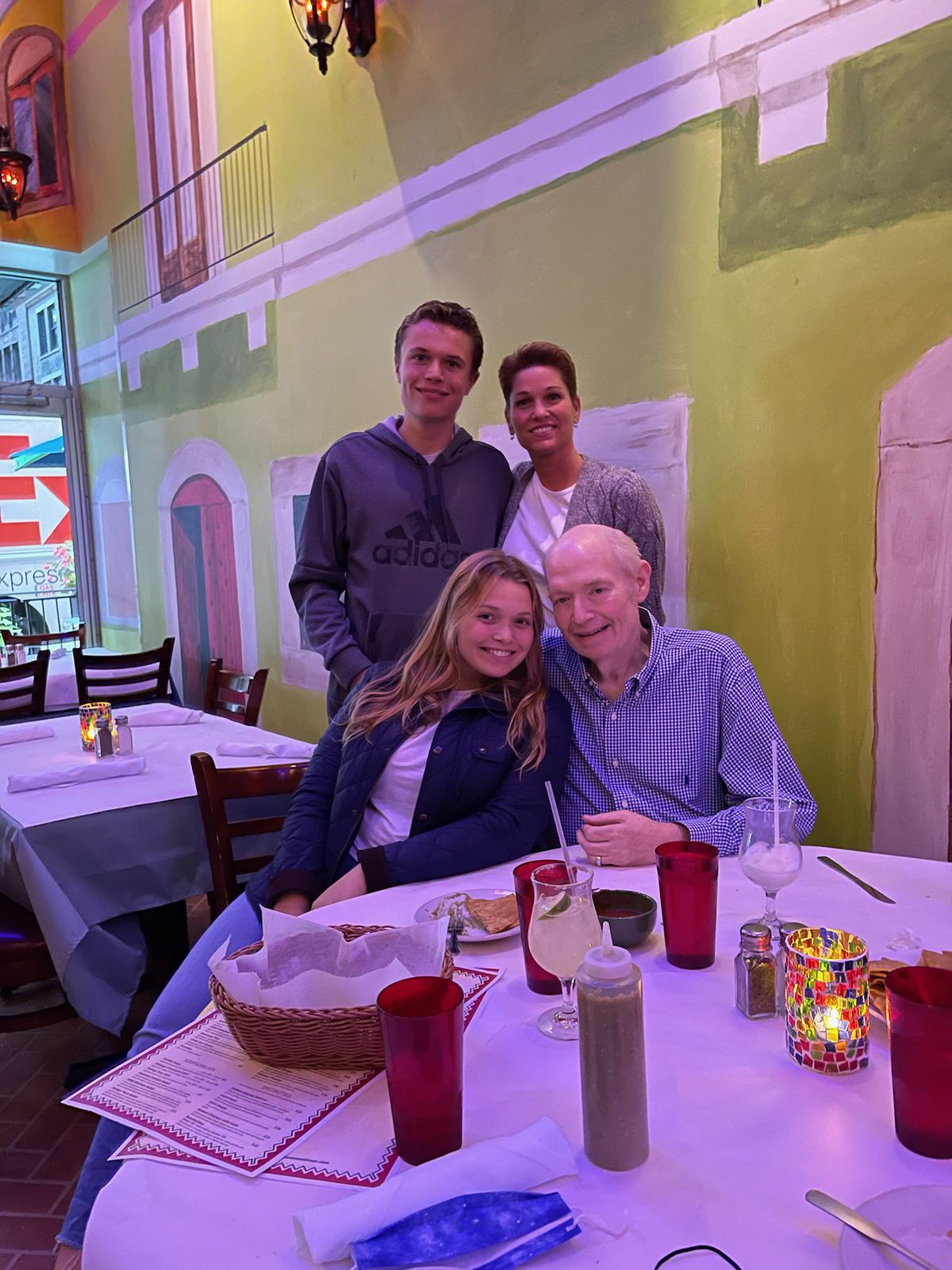 The Malnati family gathers at its newest restaurant, Amigos, in September 2021.