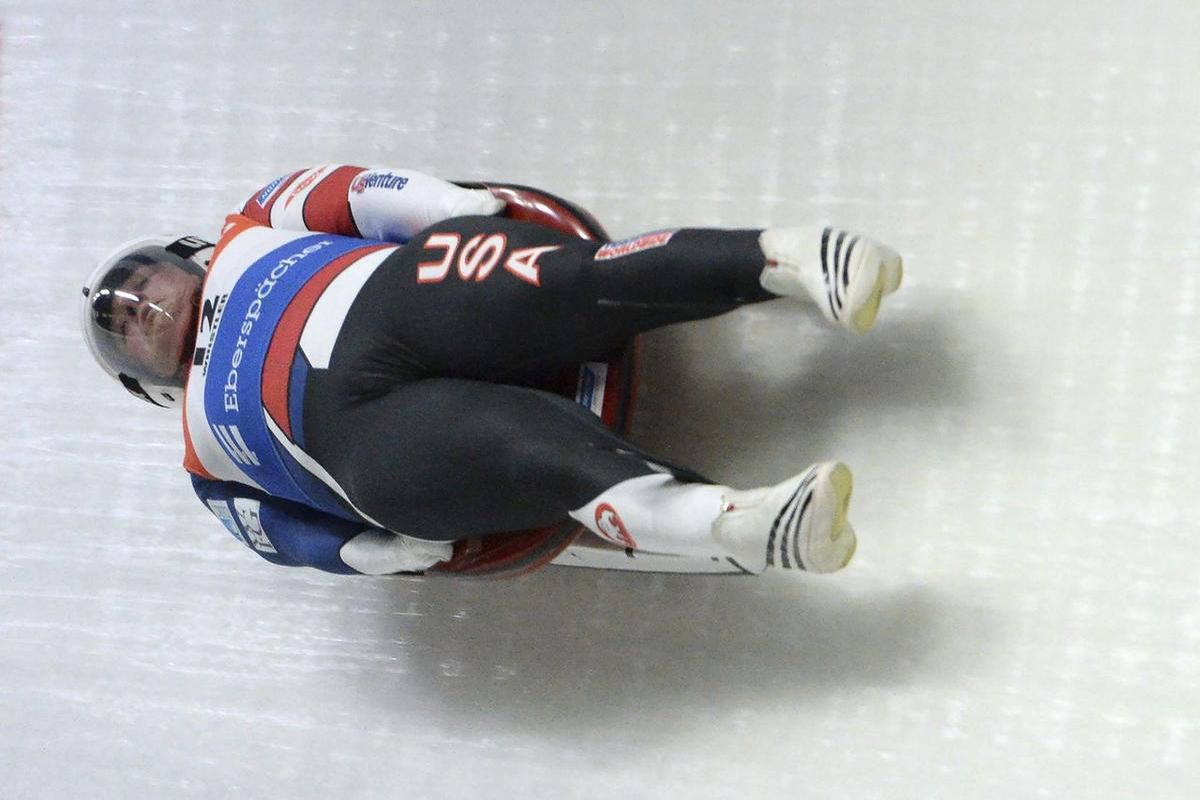 Taylor Morris of the United States slides during a men's World Cup Luge event, Saturday, Dec. 10, 2016 in Whistler, British Columbia. (Jonathan Hayward/The Canadian Press via AP)