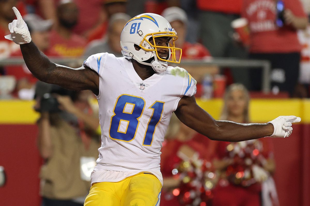 Mike Williams #81 of the Los Angeles Chargers celebrates after scoring a touchdown during the third quarter against the Kansas City Chiefs at Arrowhead Stadium on September 15, 2022 in Kansas City, Missouri.