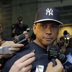 FILE - in this April 1, 2013, file photo, New York Yankees' Alex Rodriguez, who is on the disabled list after hip surgery, talks to reporters outside the Yankees' clubhouse in New York. A person familiar with the case tells The Associated Press Tuesday June 4, 2013 that the founder of a Miami anti-aging clinic has agreed to talk to Major League Baseball about players linked to performance-enhancing drugs. Alex Rodriguez, Ryan Braun, Nelson Cruz and Melky Cabrera are among the players whose names have been tied to the clinic. 