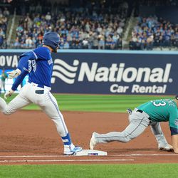 Toronto Blue Jays center fielder Kevin Kiermaier (39) is out at first by Seattle Mariners first baseman Ty France (23) during the second inning at Rogers Centre.