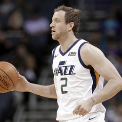 Utah Jazz's Joe Ingles (2)brings the ball up the court against the Charlotte Hornets during the first half of an NBA basketball game in Charlotte, N.C., Friday, Jan. 12, 2018. (AP Photo/Chuck Burton)