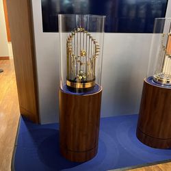 <strong><em>The two Royals’ World Series trophies.</em></strong>