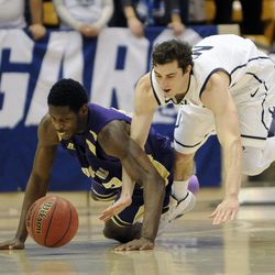 Prairie View A&M Panthers forward Rasi Jenkins (22) and BYU guard Matt Carlino (2) fight for a loose ball during a game at the Marriott Center in Provo on Wednesday, Dec. 11, 2013.
