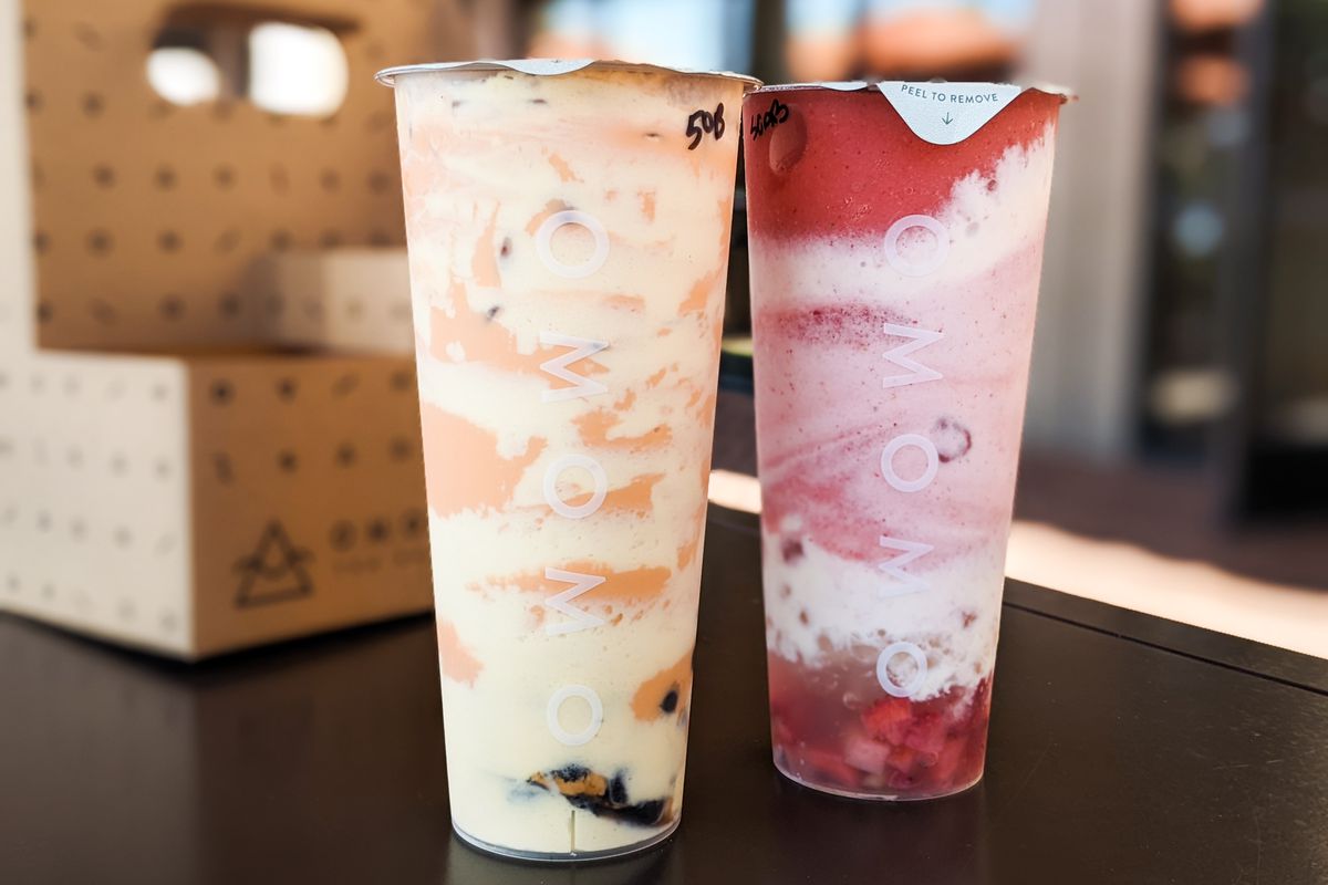Two colorful boba drinks.