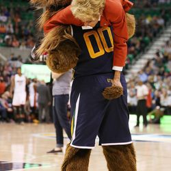 Bear carries a security guard in Salt Lake City on Thursday, Dec. 1, 2016. Miami won 111-110.