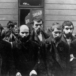 In this April/May 1943 file photo, a group of religious Jews are being held under arrest by German SS soldiers during the destruction of the Warsaw Ghetto by German troops, following an uprising in the Jewish quarter. Friday, April 19, 2013 anniversary of the start of the Warsaw ghetto uprising, a revolt that ended in death for most of the fighters yet gave the world an enduring symbol of resistance against the odds. 