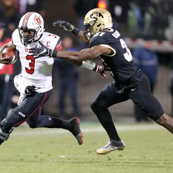 Utah Utes quarterback Troy Williams (3) runs past Colorado Buffaloes linebacker Kenneth Olugbode (31) during the first half of a football game at Folsom Field in Boulder, Colo., on Saturday, Nov. 26, 2016.