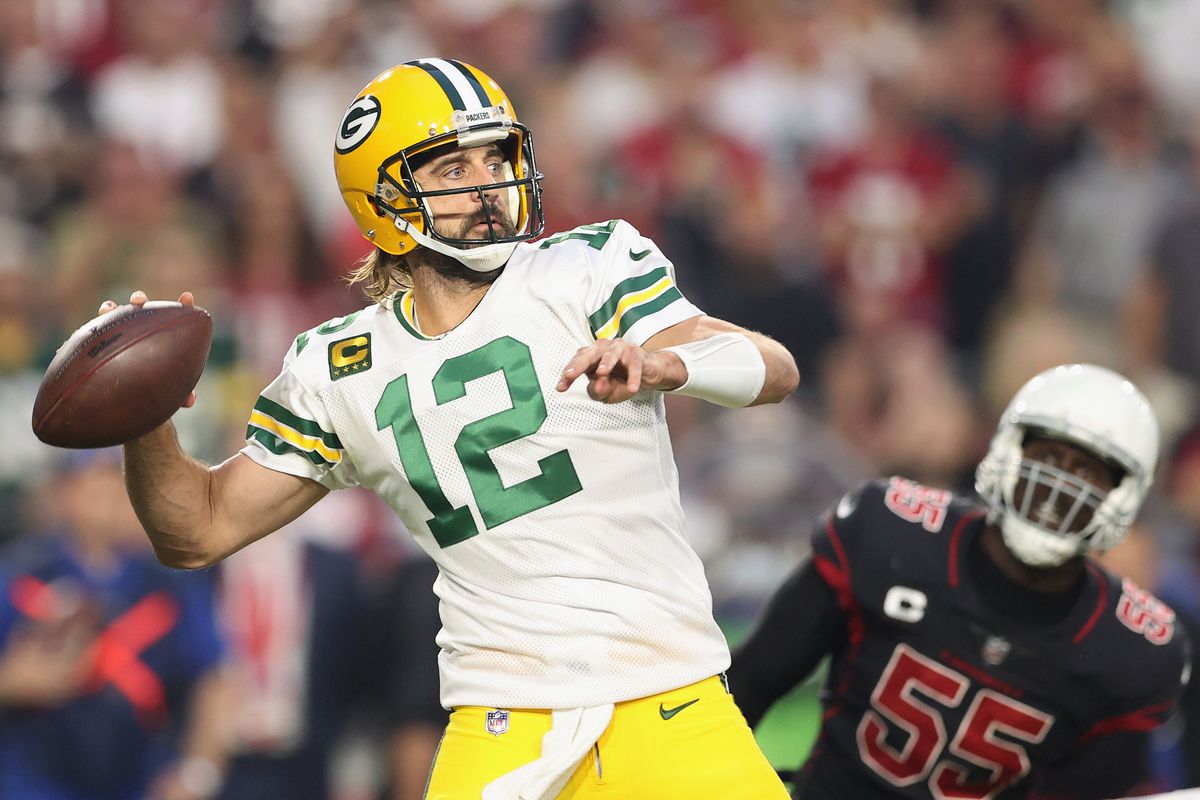 Quarterback Aaron Rodgers #12 of the Green Bay Packers throws a pass during the NFL game at State Farm Stadium on October 28, 2021 in Glendale, Arizona.
