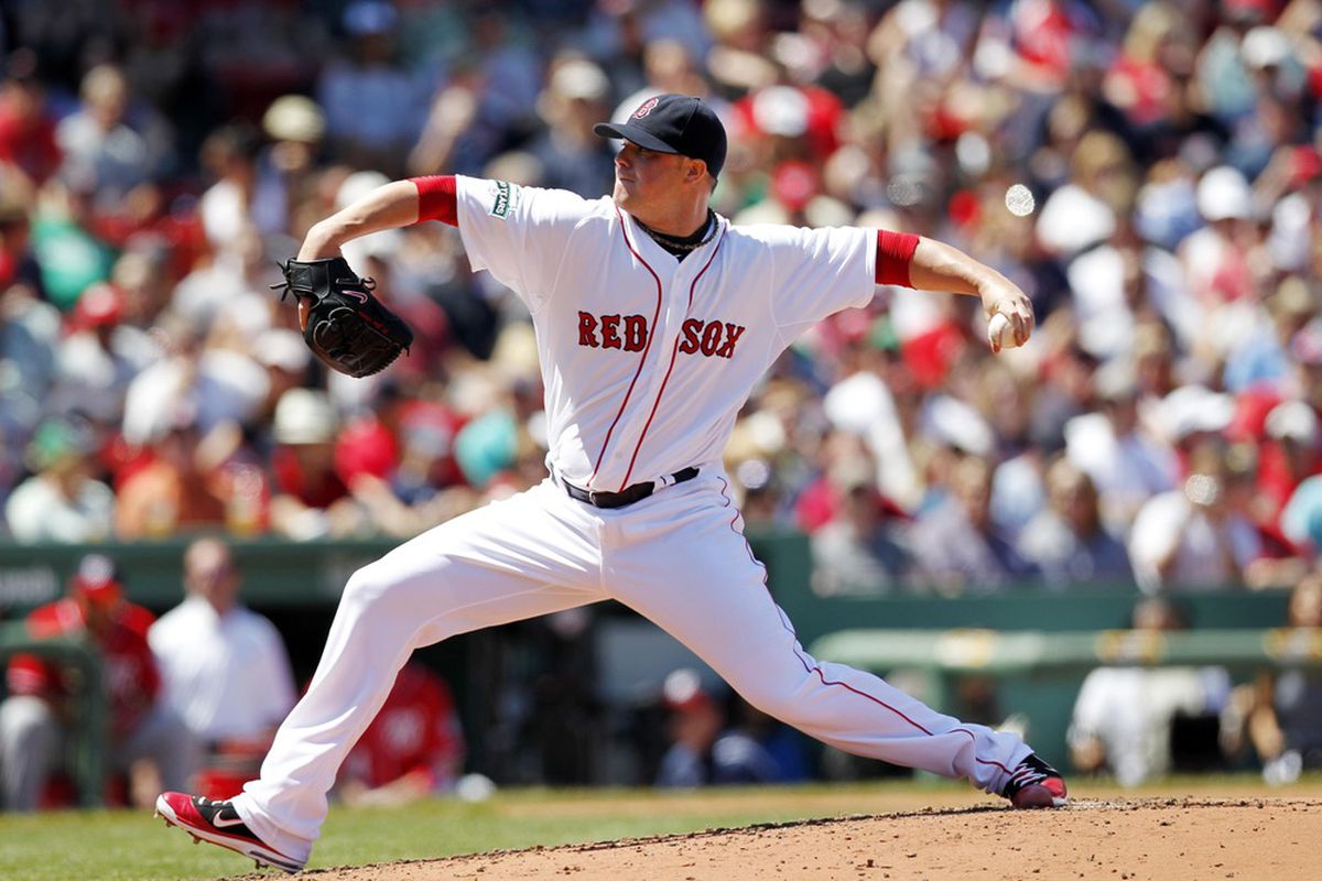 Boston, MA, USA; Boston Red Sox pitcher Jon Lester (31) delivers a pitch during the third inning against the Washington Nationals at Fenway Park.  Mandatory Credit: Greg M. Cooper-US PRESSWIRE