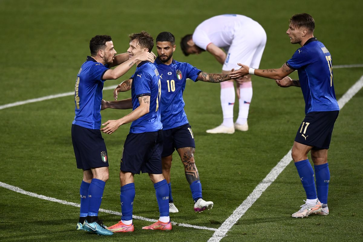 Nicolo Barella (2nd from L) of Italy celebrates with his...
