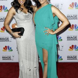 Tamera Mowry-Housley, left, and Tia Mowry-Hardrict arrive at the 43rd NAACP Image Awards on Friday, Feb. 17, 2012, in Los Angeles. (AP Photo/Matt Sayles)