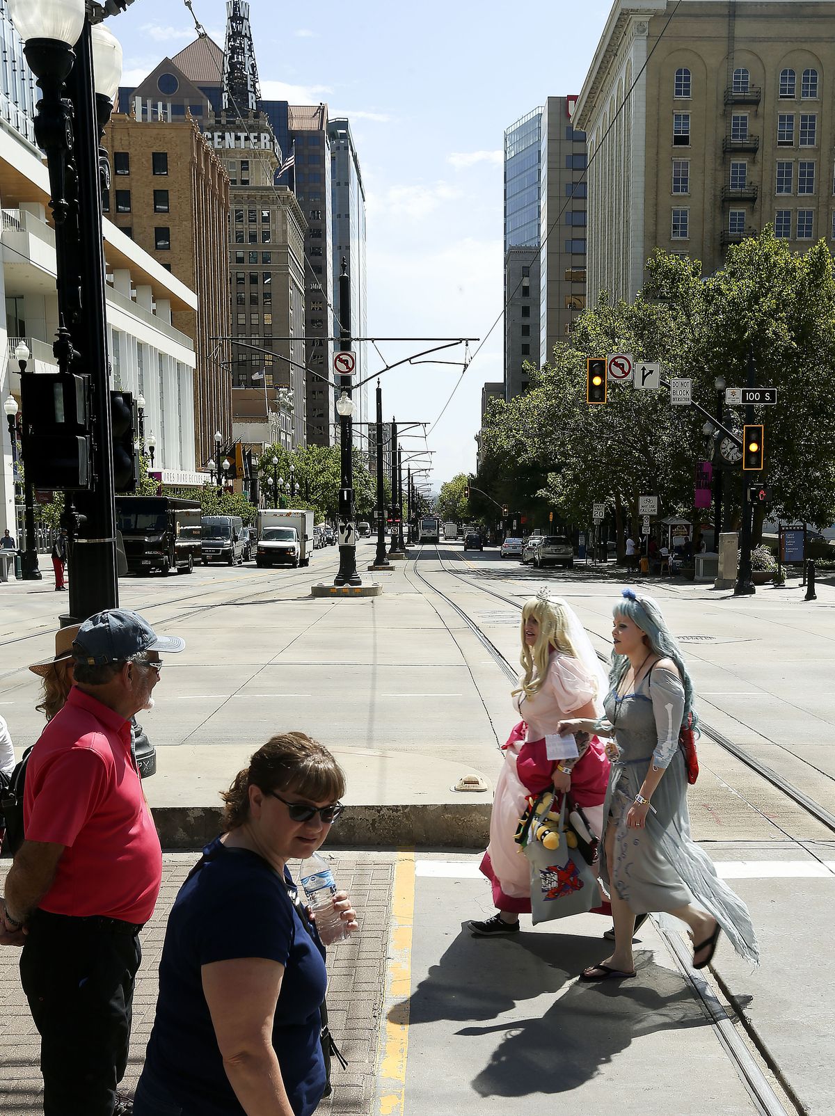 Participants of the FanX Salt Lake Comic Convention being held the Salt Palace Convention Center walk across Main Street in Salt Lake City on Thursday, Sept. 5, 2019. This weekend the city will play host to the Greek Festival, FanX, the Utah State Fair and the Vans Park Series World Championships.