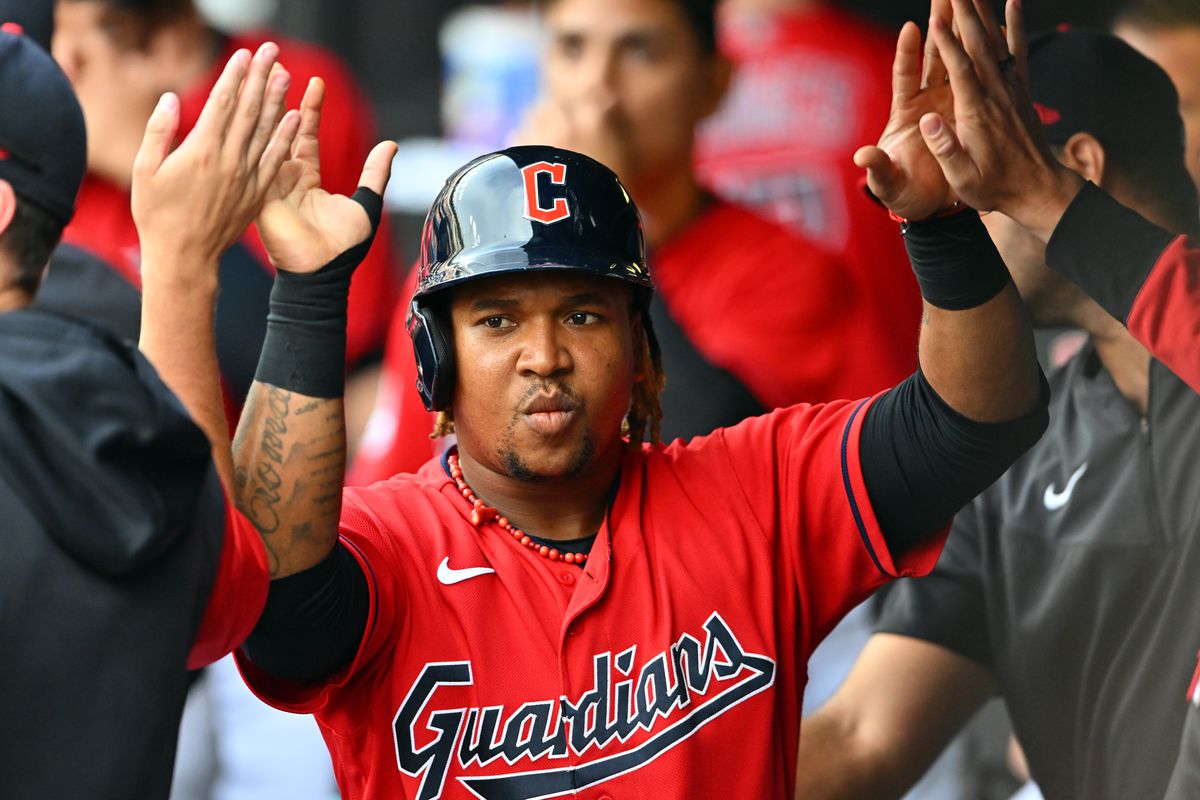 Jose Ramirez #11 of the Cleveland Guardians celebrates with teammates after scoring during the first inning against the Detroit Tigers at Progressive Field on July 15, 2022 in Cleveland, Ohio.