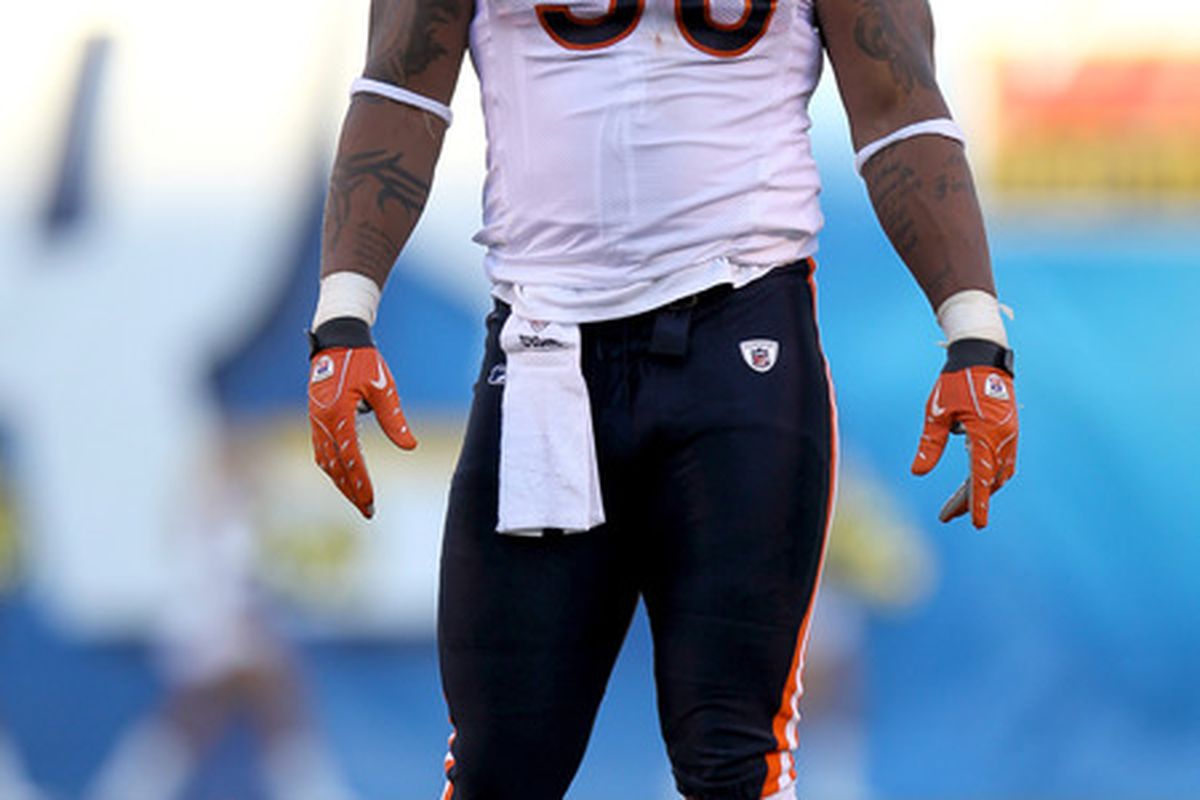 SAN DIEGO - AUGUST 14:  Defensive end Julius Peppers #90 of the Chicago Bears (Photo by Stephen Dunn/Getty Images)