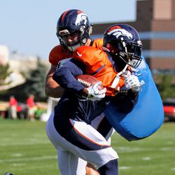Broncos players completing some individual position drills at Broncos camp.
