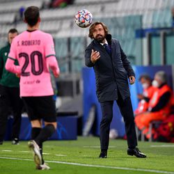 Andrea Pirlo gives the ball to Sergi Roberto