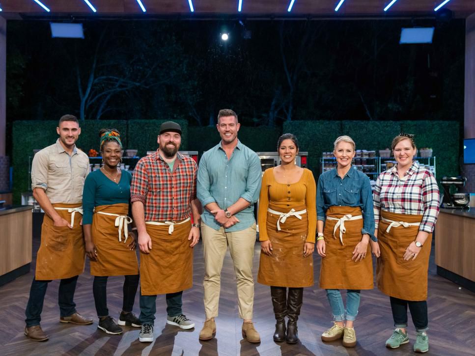 The contestants of Bakeaway Camp standing with host Jesse Palmer